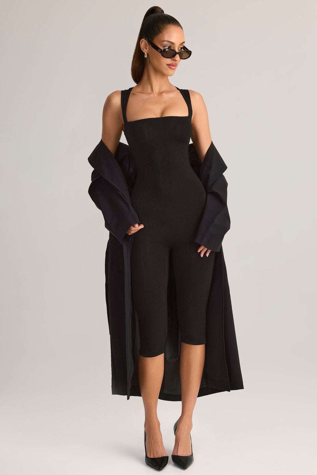 Modal Square-Neck Bodycon Capri Jumpsuit in Black — styled, front view