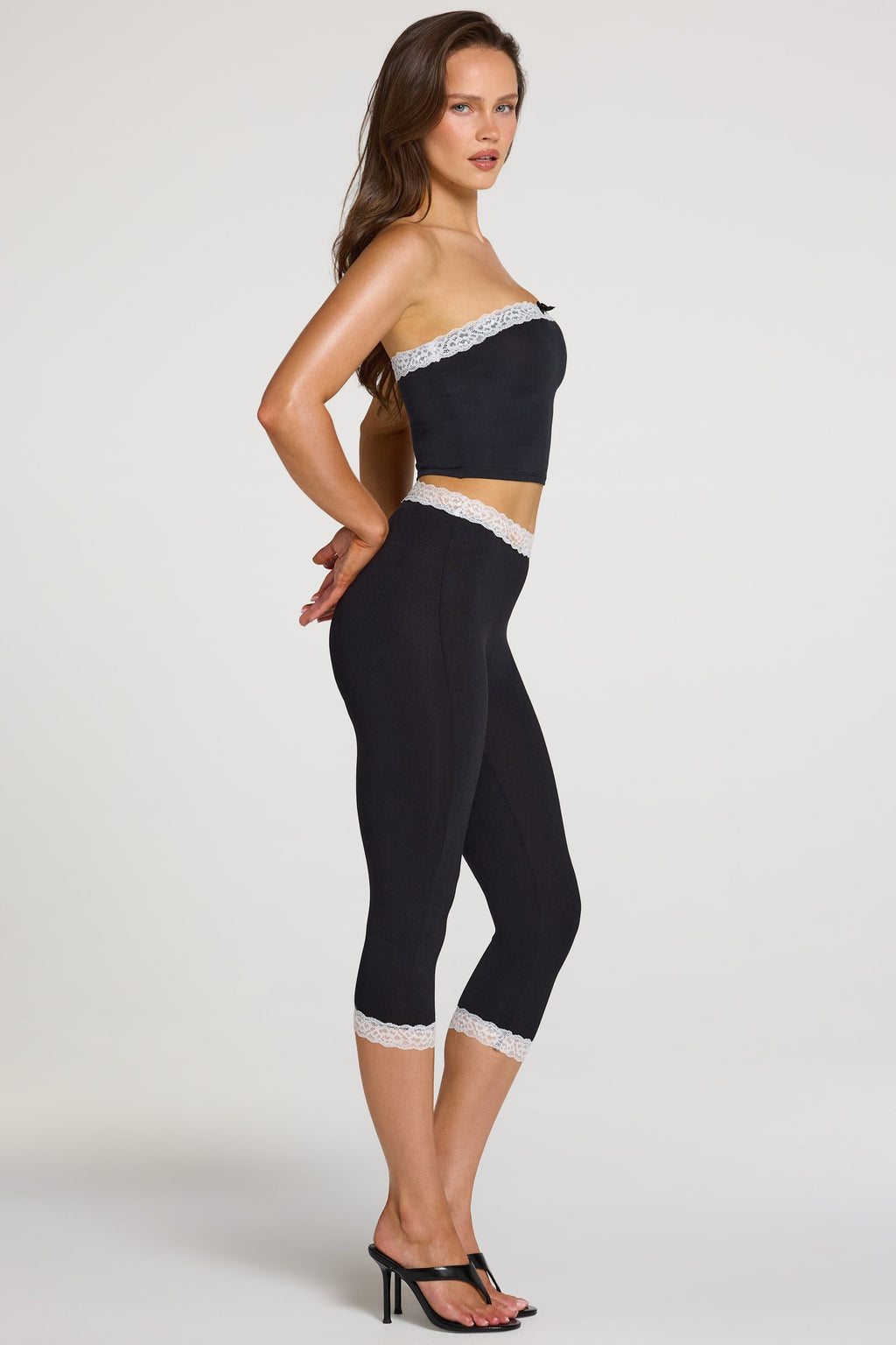 Modal Lace-Trim Mid-Rise Capri Leggings in Black — front view