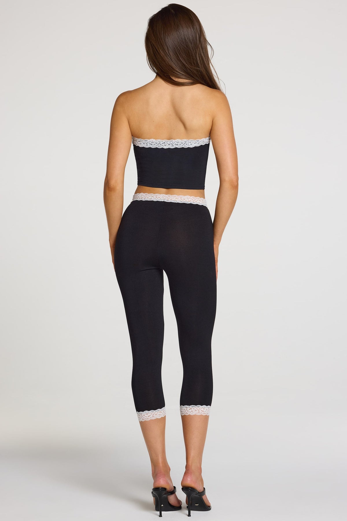 Modal Lace-Trim Mid-Rise Capri Leggings in Black — back view