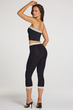 Modal Lace-Trim Mid-Rise Capri Leggings in Black — side view