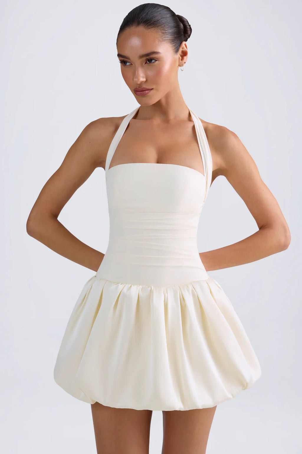 Lace-Up Bubble Hem Corset Mini Dress in Butter Yellow — front view