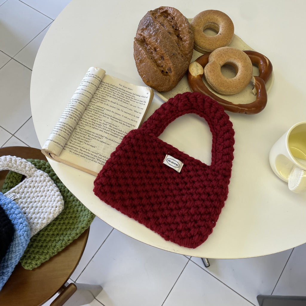 Wren crochet mini tote bag in red — styled