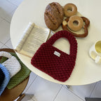 Wren crochet mini tote bag in red — styled