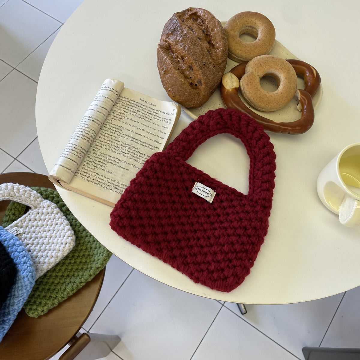 Wren crochet mini tote bag in red — styled