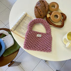 Wren crochet mini tote bag in old pink — styled