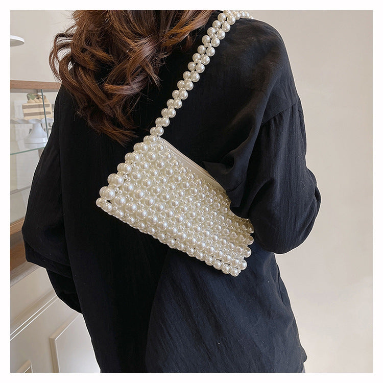 Beatrix faux-pearl shoulder bag — on model