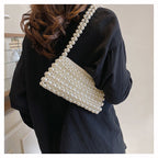 Beatrix faux-pearl shoulder bag — on model