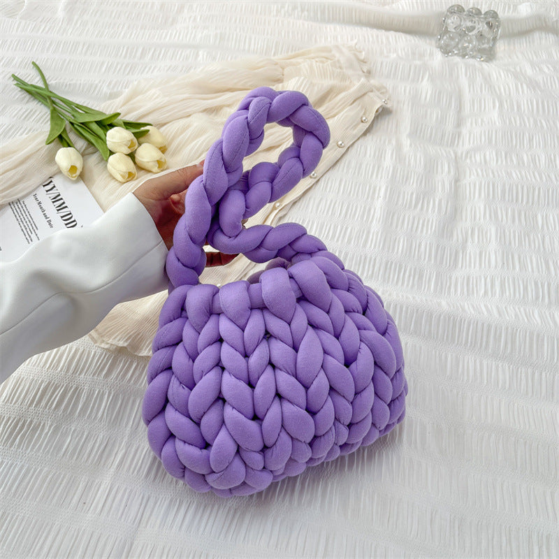 Ottilie woven tote bag in purple — three-quarter view