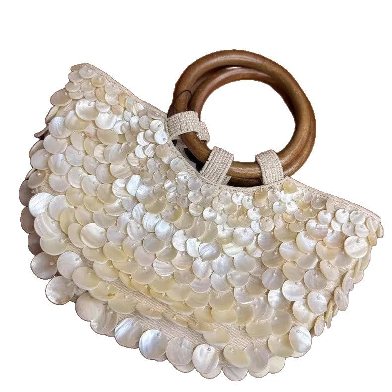 Marina shell-effect handbag — back view