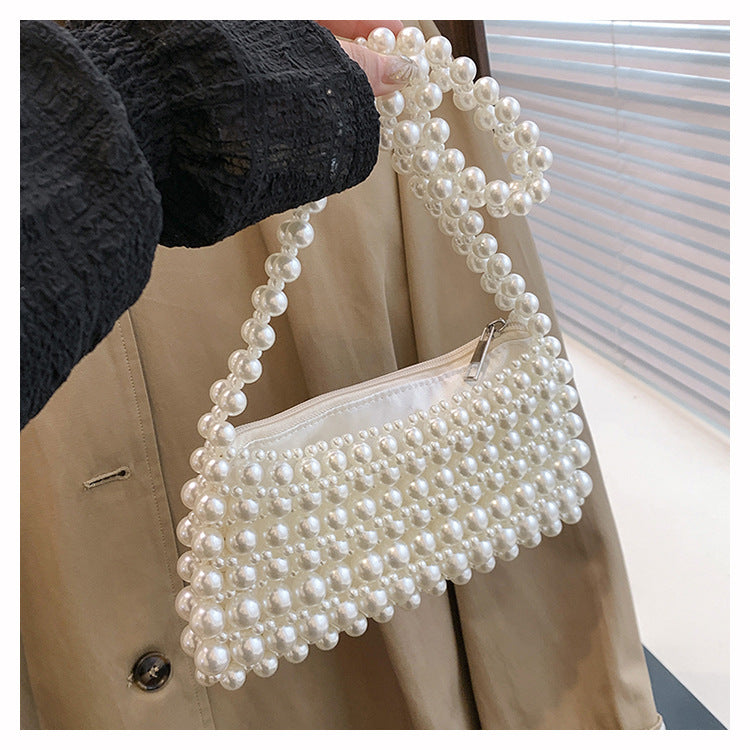 Beatrix faux-pearl shoulder bag — on model