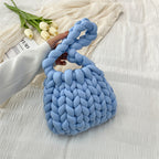 Ottilie woven tote bag in blue — three-quarter view