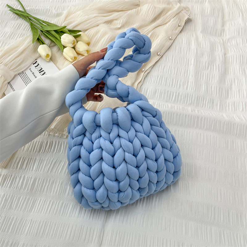 Ottilie woven tote bag in blue — three-quarter view
