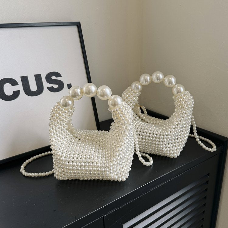 Odette faux-pearl handbag — styled