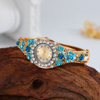 Floral Crystal Bangle Watch in blue — front view