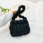 Ottilie woven tote bag in black — three-quarter view
