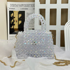 Esme crystal-bead mini bag in white — styled