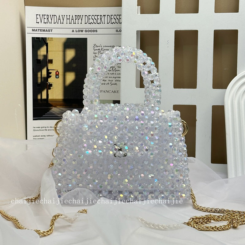 Esme crystal-bead mini bag in white — styled