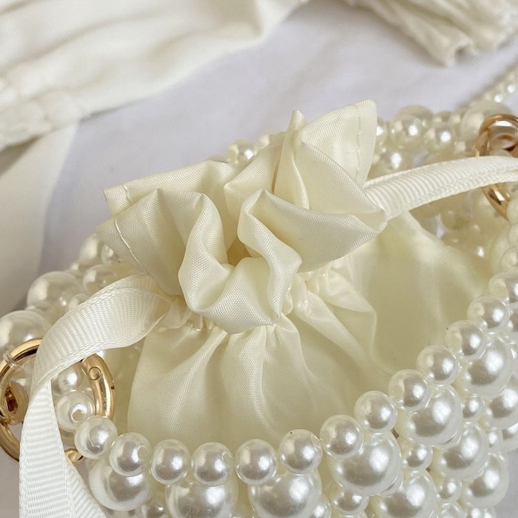 Isla faux-pearl bucket bag — detail