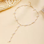 Minimal Pearl Drop Necklace — flat lay