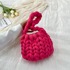 Ottilie woven tote bag — three-quarter view