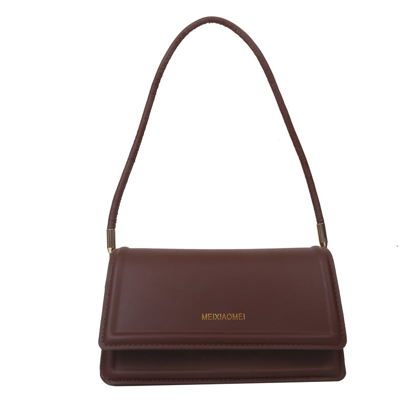 Harriet minimalist structured shoulder bag in brown — side view