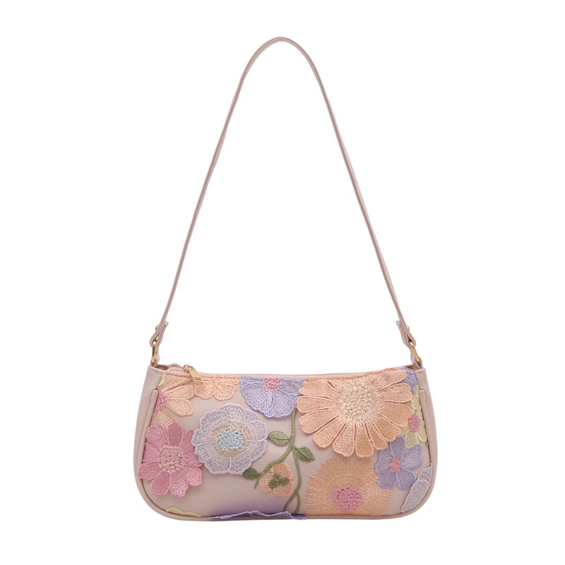 Primrose pastel floral embroidery shoulder bag in pink — front view