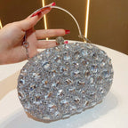 Seraphina crystal-bead evening clutch in silver — three-quarter view