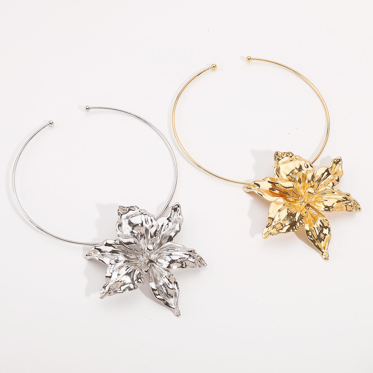 Bloom Metallic Statement Necklace in Gold and Silver — flat lay