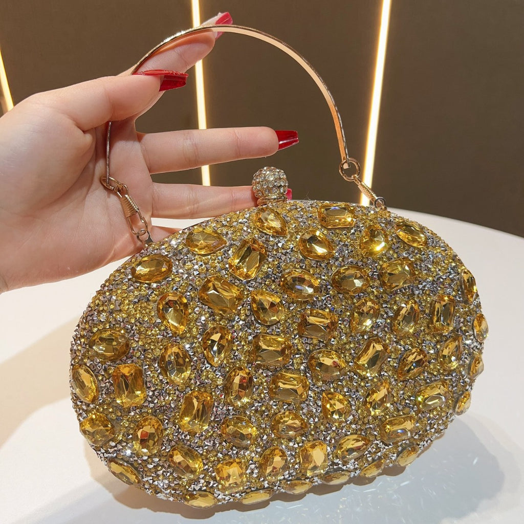 Seraphina crystal-bead evening clutch in gold — three-quarter view