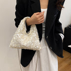 Sylvie sequin hobo bag in white — on model