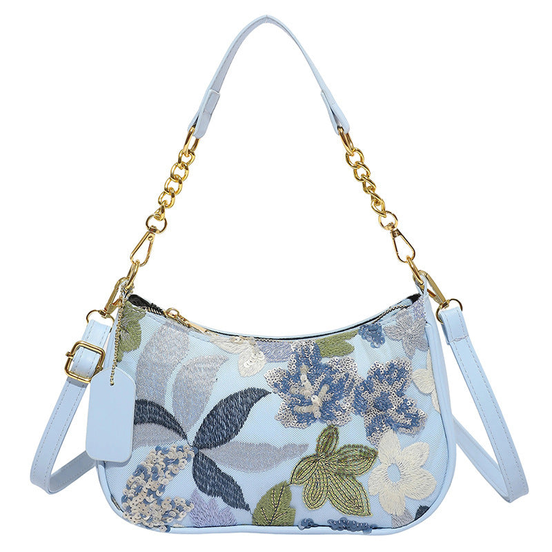Elodie floral sequin shoulder bag — front view