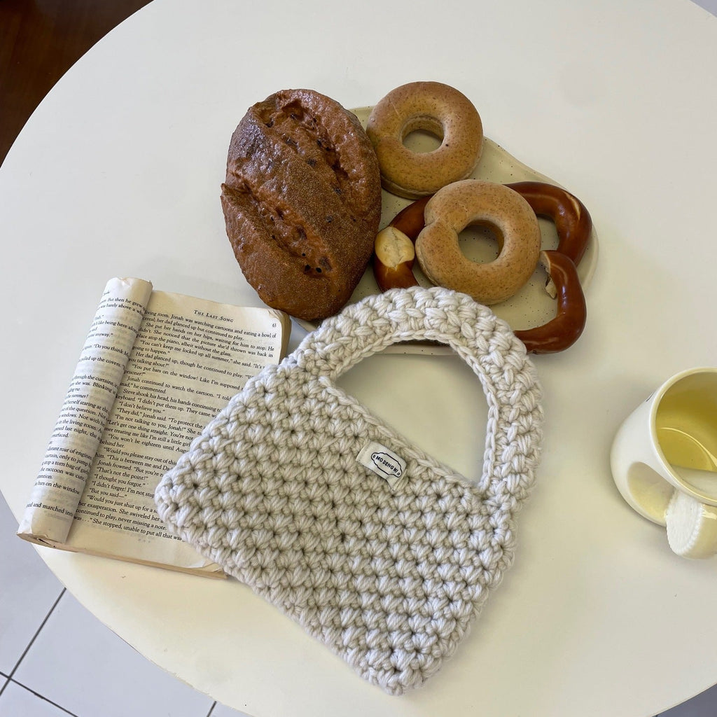 Wren crochet mini tote bag in white — styled