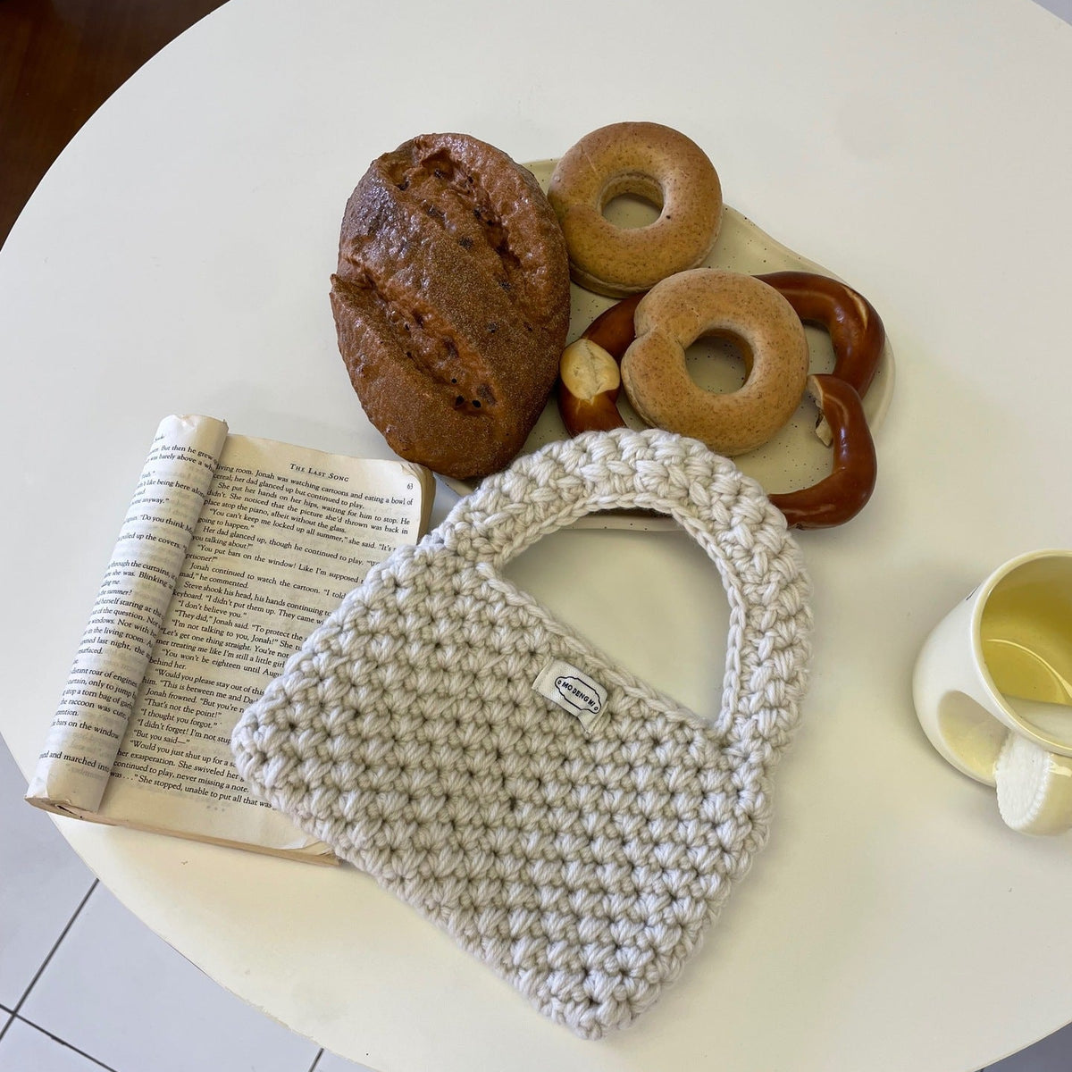 Wren crochet mini tote bag in white — styled