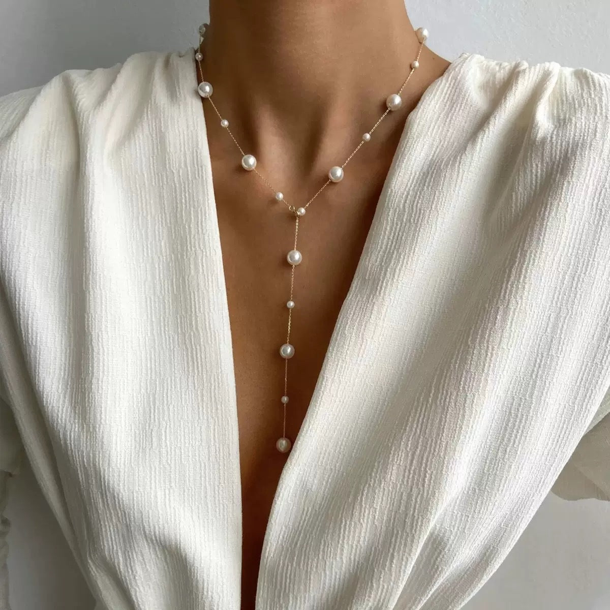 Minimal Pearl Drop Necklace — worn on model
