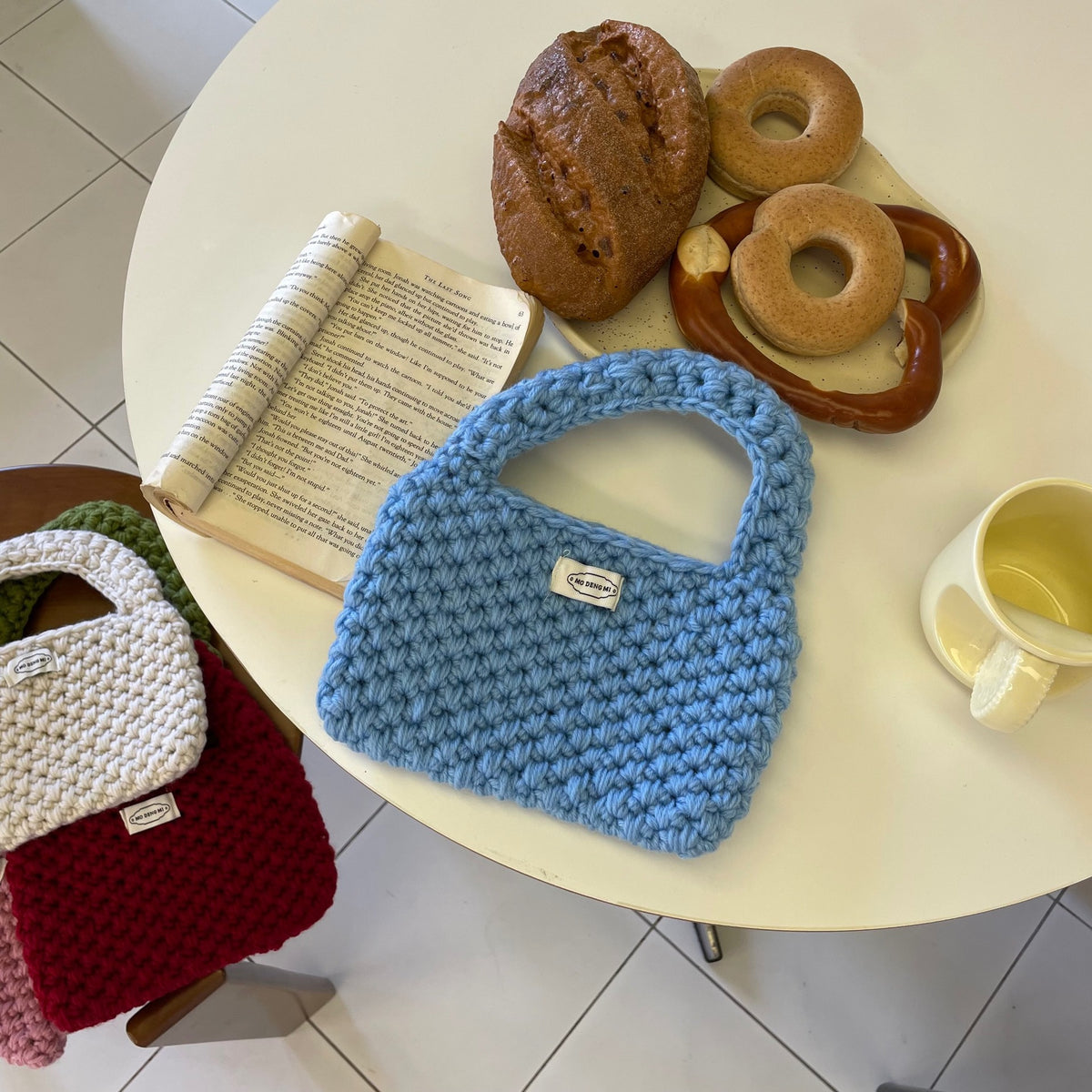 Wren crochet mini tote bag in blue — styled