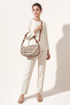 Amelie faux-pearl heart shoulder bag in brown — on model