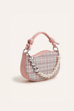 Amelie faux-pearl heart shoulder bag in pink — three-quarter view
