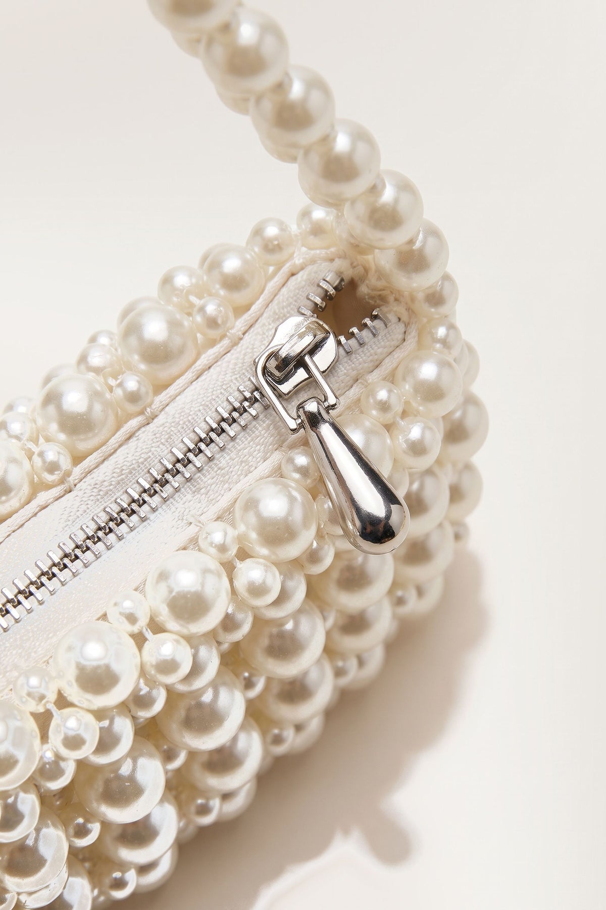 Beatrix faux-pearl shoulder bag in ivory — detail