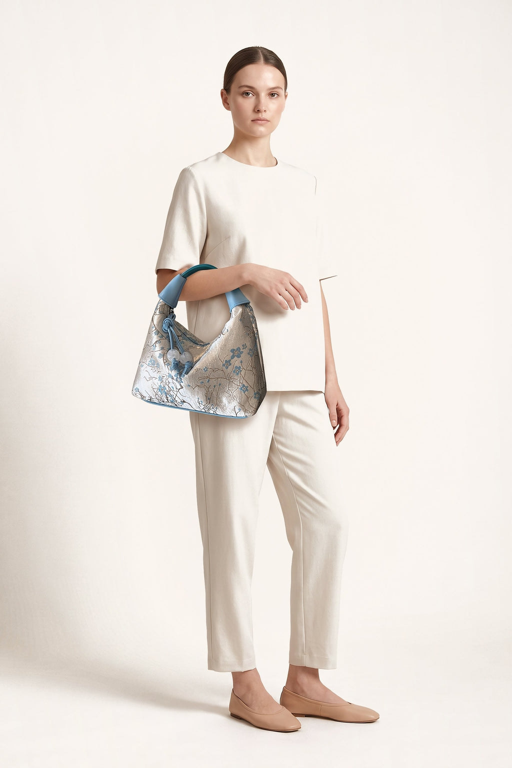 Camille blossom silk-look shoulder bag in Blue — on model