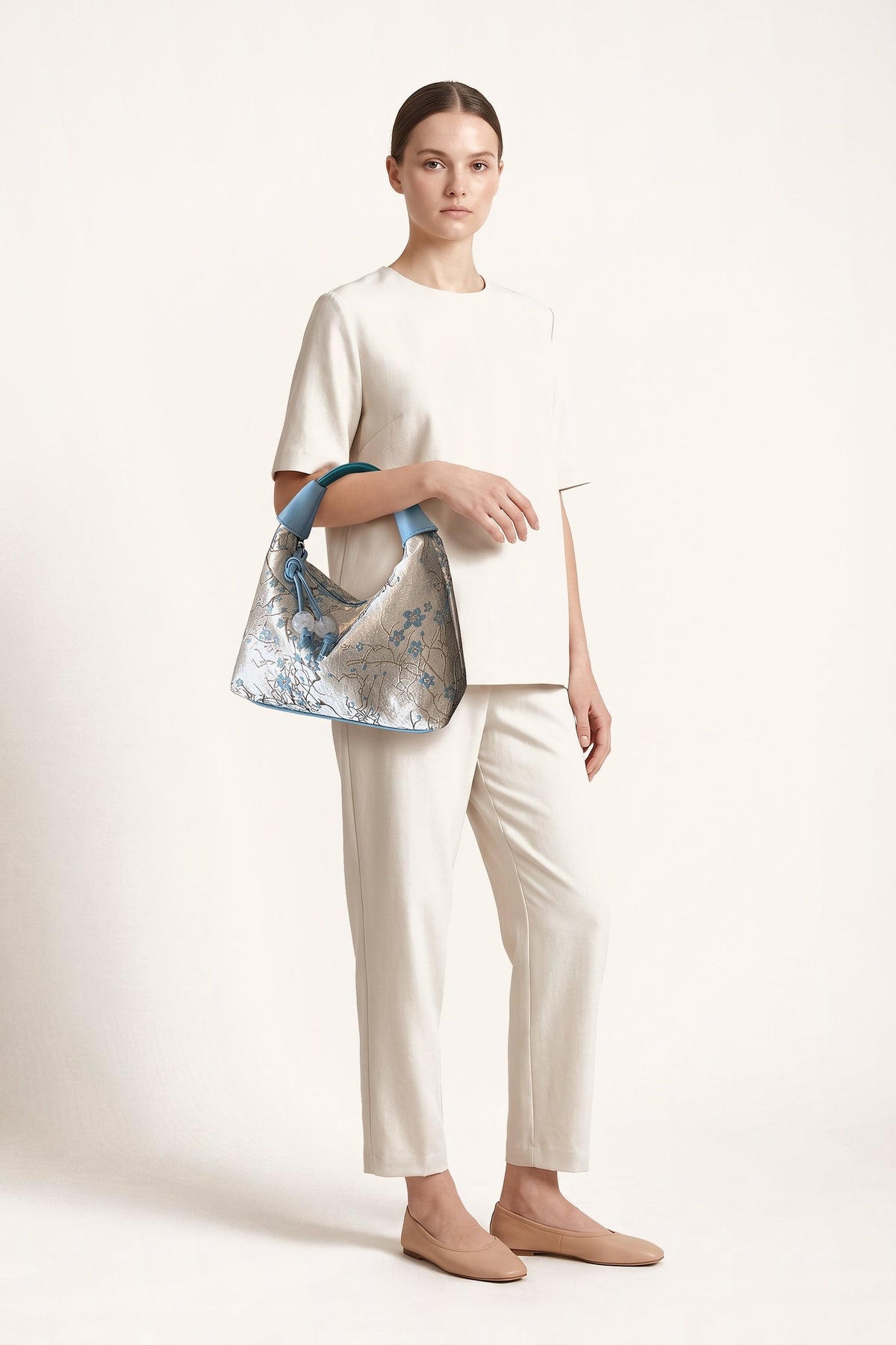 Camille blossom silk-look shoulder bag in Blue — on model