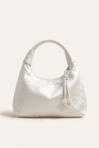 Camille blossom silk-look shoulder bag in White — front view