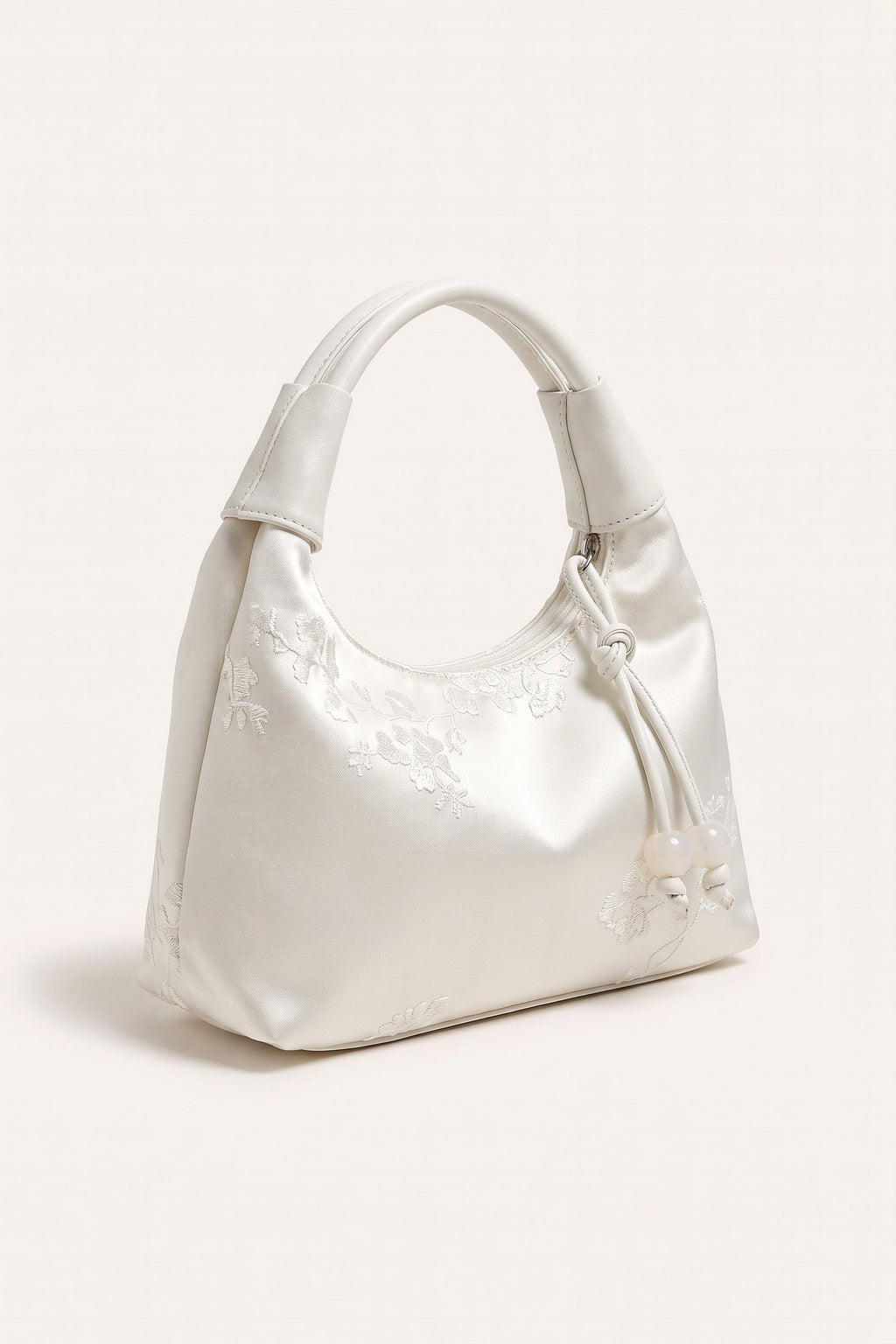 Camille blossom silk-look shoulder bag in White — three-quarter view