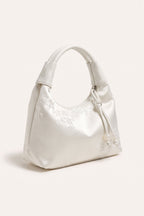 Camille blossom silk-look shoulder bag in White — three-quarter view