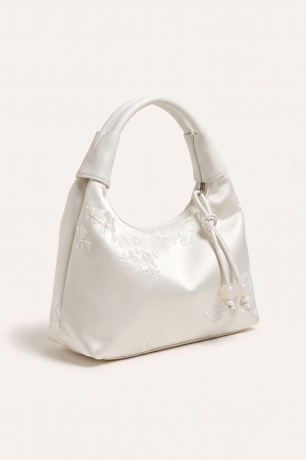 Camille blossom silk-look shoulder bag in White — three-quarter view