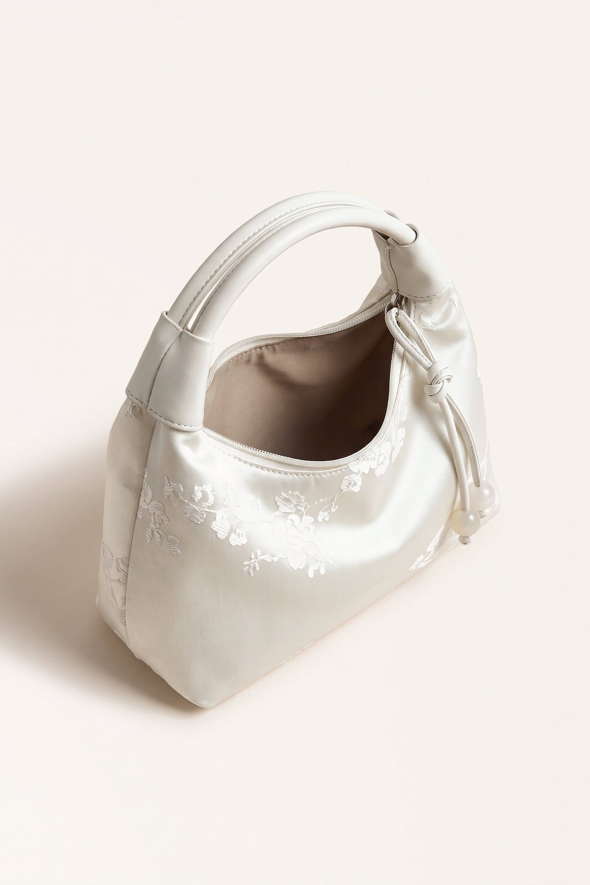 Camille blossom silk-look shoulder bag in White — open view