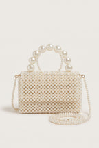 Celeste faux-pearl chain shoulder bag in ivory — front view