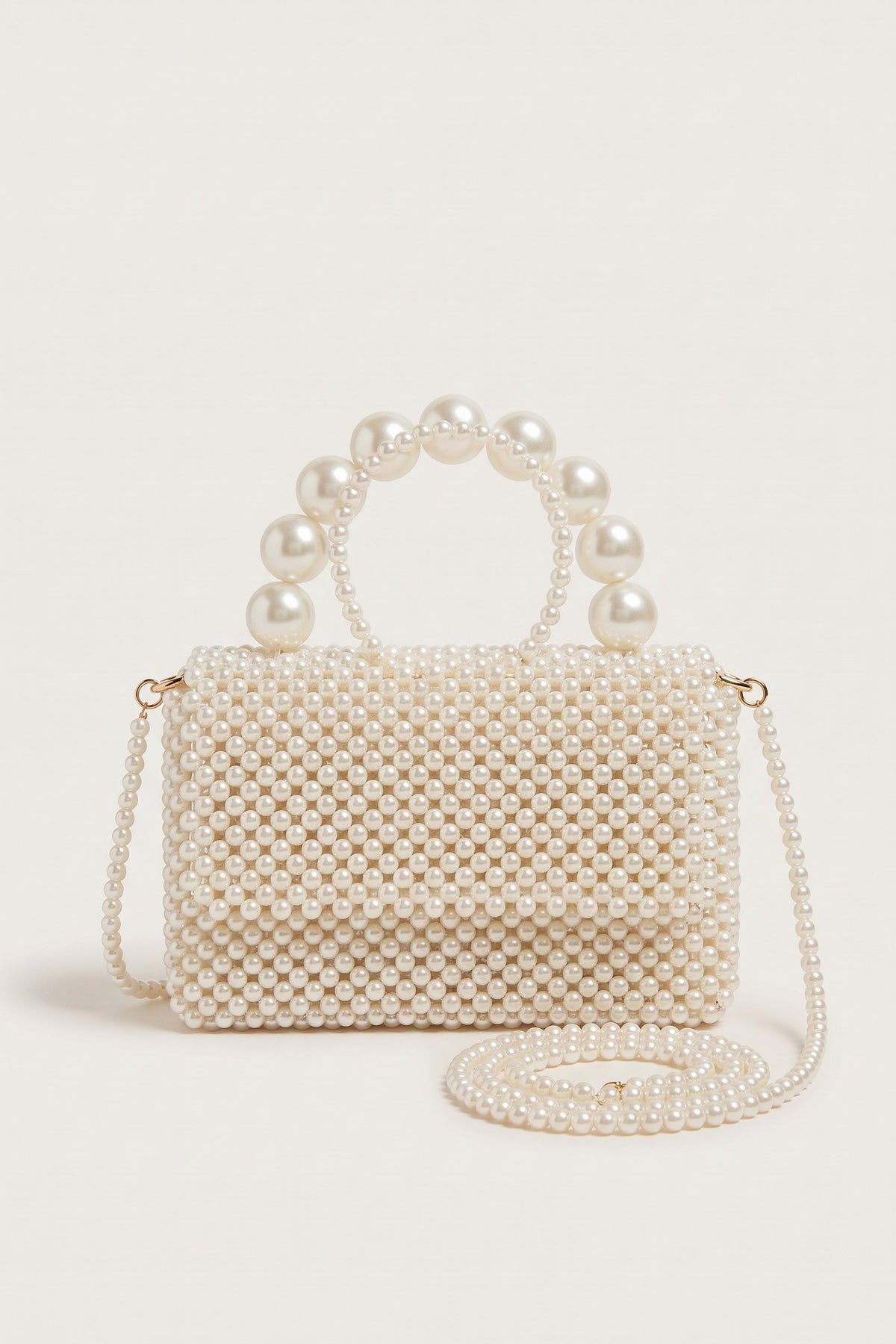 Celeste faux-pearl chain shoulder bag in ivory — front view