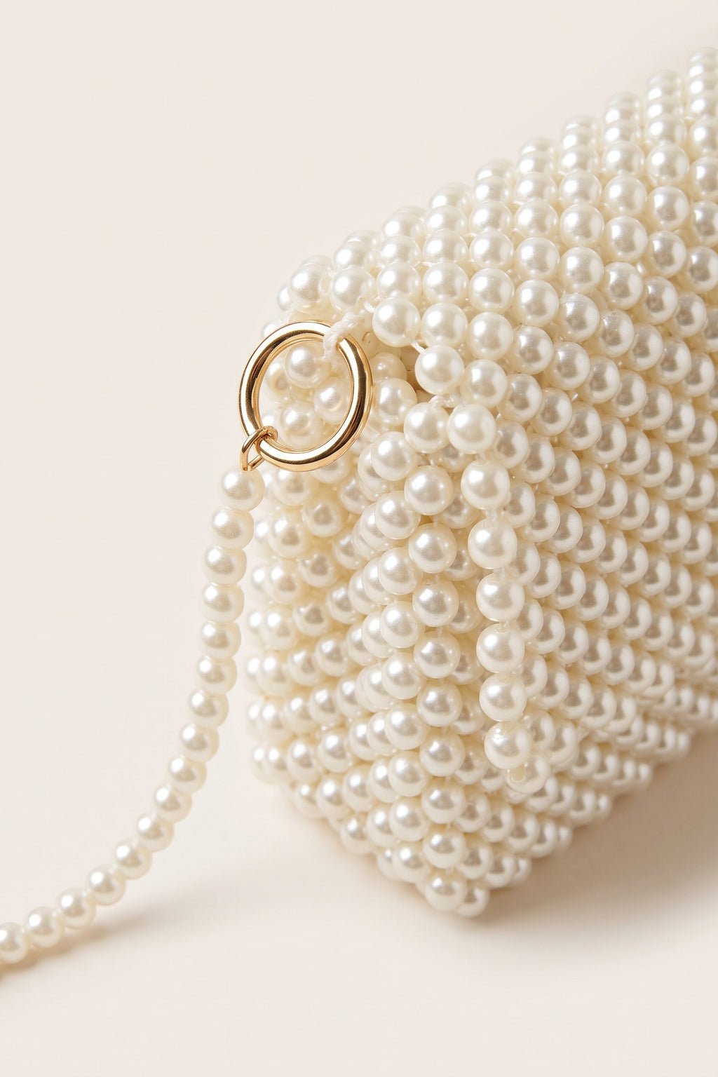 Celeste faux-pearl chain shoulder bag in ivory — detail