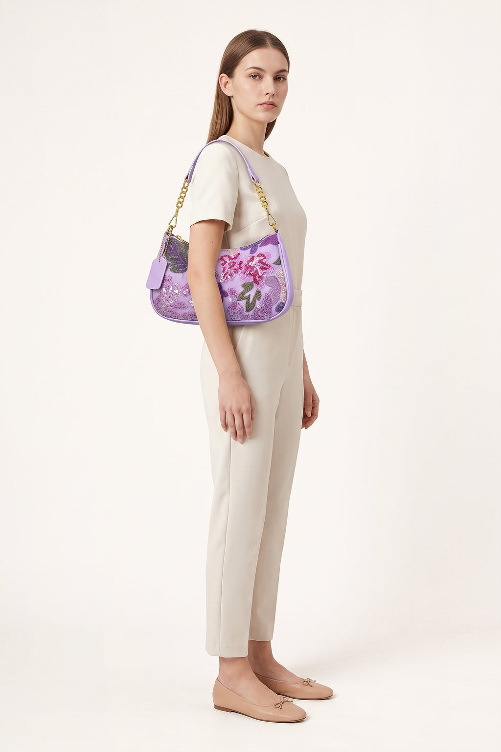Elodie floral sequin shoulder bag in Purple — on model