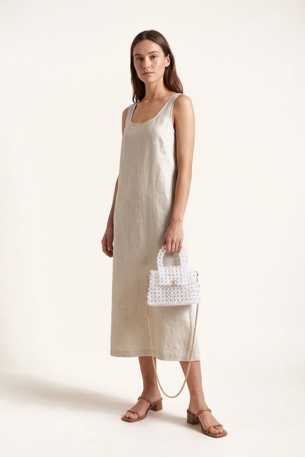 Esme mini bag in white — on model